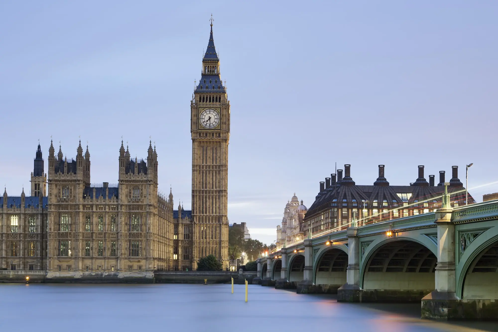 Photograph of Big Ben lock tower and bridge in London.